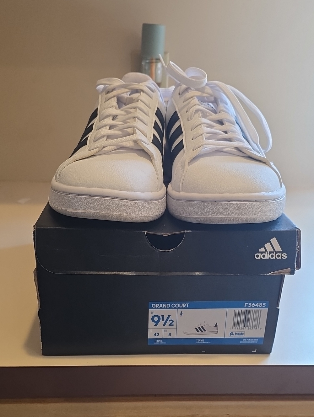 adidas White Sneakers with Black Three Stripes